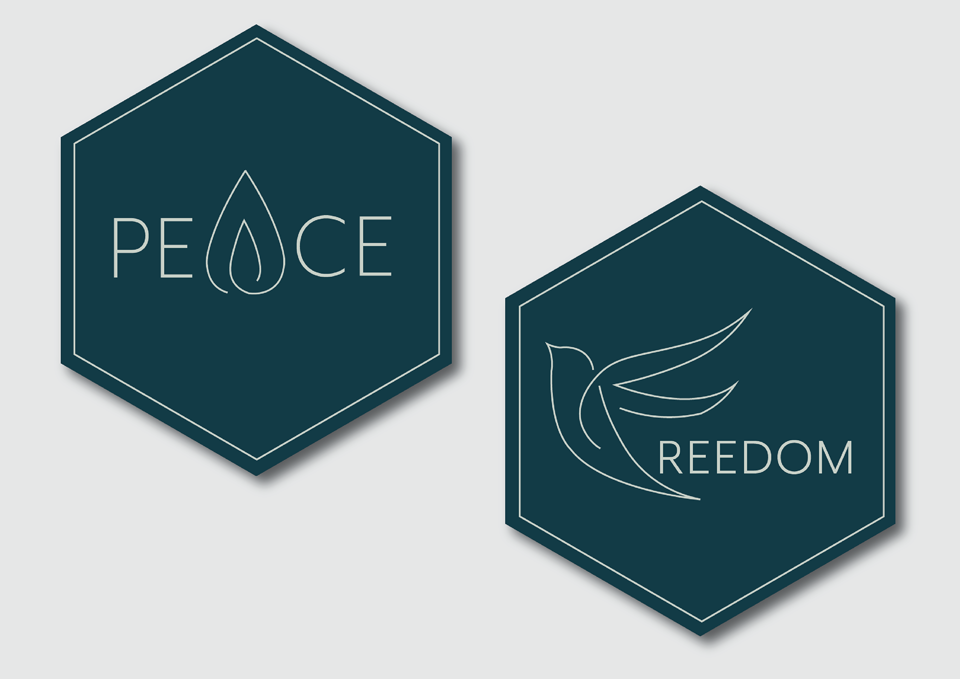 Two hexagonal marks with icons, labelled Peace and Freedom